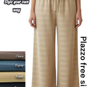 Woman wearing beige wide-leg palazzo pants with horizontal stripes and a drawstring waist.