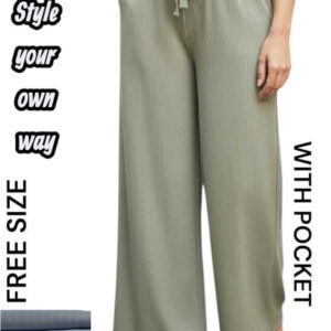 Woman wearing sage green high-waisted ribbed wide-leg lounge pants with drawstring and pockets.