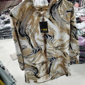 Women's ivory tunic with gold and black liquid marble abstract print and V-neck.