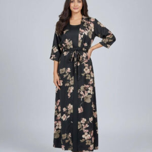 Woman wearing a black 2-piece frock dress set with a floral print kimono and waist belt.