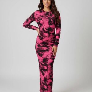 Woman wearing a long-sleeve magenta and black tie-dye bodycon maxi dress with ruching.