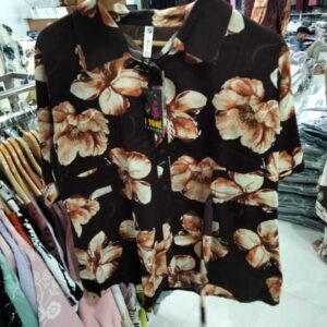 Women's brown floral button-down shirt with cream flower print and drawstring waist.
